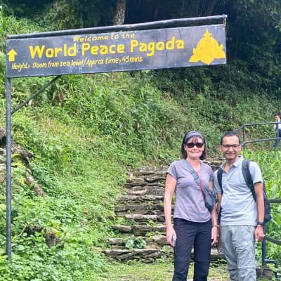 Guide Ramesh With Tourist Hiking To Peace Stupa